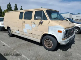 1992 GMC Vandura z VIN 2GTGG39K7N4508329, wystawiony jako Copart lot #56752215 z przebiegiem 248 713 mil mil oraz Tytuł czysty. Historia ofert i sprzedaży dostępna na DreamBid. Obrazek 4.