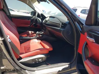 2014 BMW X1 sDrive28i with VIN WBAVM1C5XEVW51666, listed as a IAAI auction lot 42083936 with 176,465 mi miles. Bid and sale history available at carsss.com. Image 5.