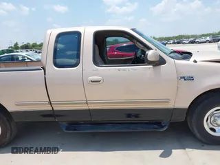 1997 Ford F-150 with VIN 1FTDX1769VNB04591, listed as a IAAI auction lot 42318471 with 202,860 mi miles and . Bid and sale history available at DreamBid. Image 13.