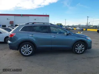 2011 Mazda CX-9 Grand Touring with VIN JM3TB3DV9B0310575, listed as a IAAI auction lot 41313813 with 146,915 mi miles. Bid and sale history available at carsss.com. Image 13.