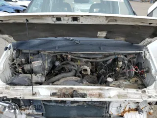 1994 Ford Aerostar z VIN 1FMDA31U3RZA55385, wystawiony jako Copart lot #54246685 z przebiegiem 229 036 mil mil oraz Szkoda całkowita • Salvage title. Historia ofert i sprzedaży dostępna na DreamBid. Obrazek 12.
