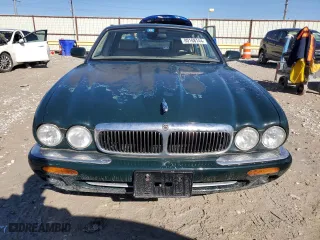 2001 Jaguar XJ with VIN SAJDA14CX1LF26357, listed as a Copart auction lot 80168144 with 82,512 mi miles and Clean Title. Bid and sale history available at carsss.com. Image 5.