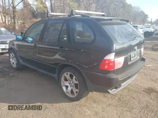 2003 BMW X5 4.4i with VIN 5UXFB33543LH43200, listed as a IAAI auction lot 41652303 with 169,250 mi miles. Bid and sale history available at carsss.com. Image 3.