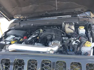 2021 Jeep Gladiator Willys with VIN 1C6HJTAGXML613431, listed as a IAAI auction lot 42180502 with 64,572 mi miles and . Bid and sale history available at DreamBid. Image 9.