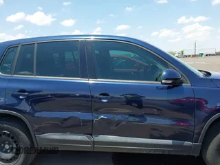 2013 Volkswagen Tiguan with VIN WVGCV3AX6DW605876, listed as a IAAI auction lot 42431619 with 106,279 mi miles and . Bid and sale history available at DreamBid. Image 13.