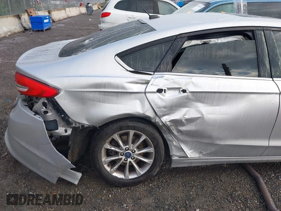 2017 Ford Fusion SE z VIN 3FA6P0HD2HR149699, wystawiony jako IAAI lot #41872383 z przebiegiem 95 587 mil mil oraz . Historia ofert i sprzedaży dostępna na DreamBid. Obrazek 6.