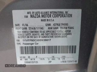 2006 Mazda 6 i with VIN 1YVFP80CX65M36617, listed as a IAAI auction lot 42059906 with 189,192 mi miles. Bid and sale history available at carsss.com. Image 9.