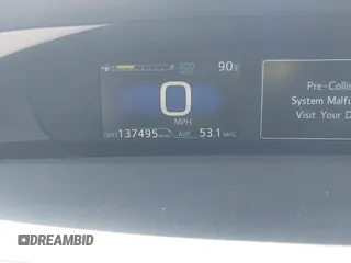 2021 Toyota Prius L Eco z VIN JTDKAMFU6M3141392, wystawiony jako IAAI lot #42317866 z przebiegiem 137 495 mil mil oraz . Historia ofert i sprzedaży dostępna na DreamBid. Obrazek 6.