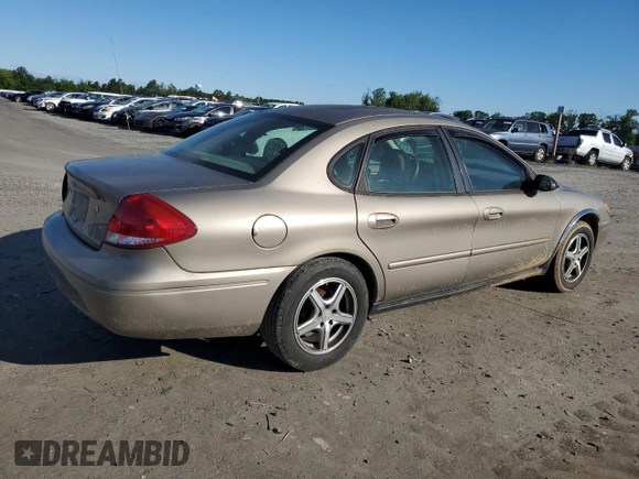 2004 Ford Taurus SE z VIN 1FAFP53284A156633, wystawiony jako Copart lot #58164985 z przebiegiem 91 246 mil mil oraz Szkoda całkowita • Salvage title. Historia ofert i sprzedaży dostępna na DreamBid. Obrazek 3.