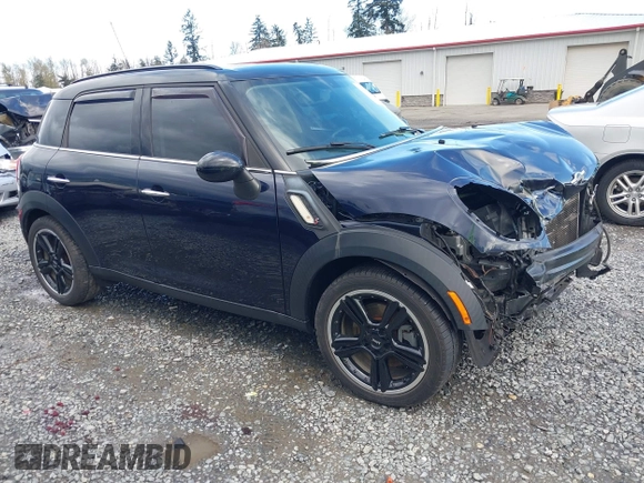 2015 MINI Countryman S z VIN WMWZC3C57FWT06297, wystawiony jako IAAI lot #41988157 z przebiegiem 74 461 mil mil oraz . Historia ofert i sprzedaży dostępna na DreamBid. Obrazek 1.