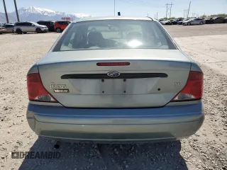 2004 Ford Focus SE with VIN 1FAFP34334W178697, listed as a Copart auction lot 53195525 with 139,932 mi miles and Salvage title. Bid and sale history available at DreamBid. Image 6.