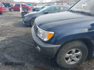 2002 Toyota Land Cruiser with VIN JTEHT05J122018974, listed as a IAAI auction lot 41543290 with 266,926 mi miles. Bid and sale history available at carsss.com. Image 6.