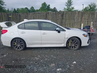 2021 Subaru WRX STI z VIN JF1VA2S69M9816079, wystawiony jako IAAI lot #42453417 z przebiegiem 19 481 mil mil oraz . Historia ofert i sprzedaży dostępna na DreamBid. Obrazek 14.