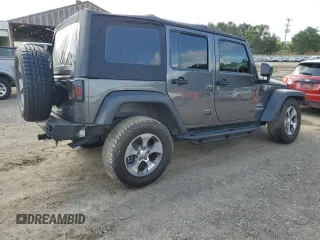 2017 Jeep Wrangler Unlimited Sport with VIN 1C4BJWDG8HL680627, listed as a Copart auction lot 61241735 with 100,890 mi miles and Salvage title. Bid and sale history available at DreamBid. Image 3.