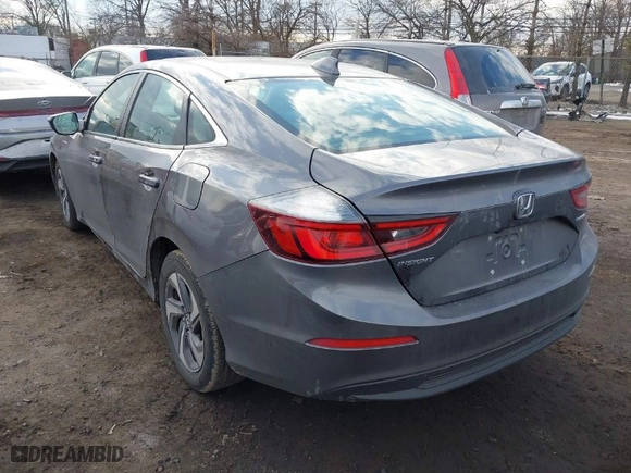 2019 Honda Insight EX with VIN 19XZE4F54KE023052, listed as a IAAI auction lot 41441617 with 124,850 mi miles. Bid and sale history available at carsss.com. Image 3.