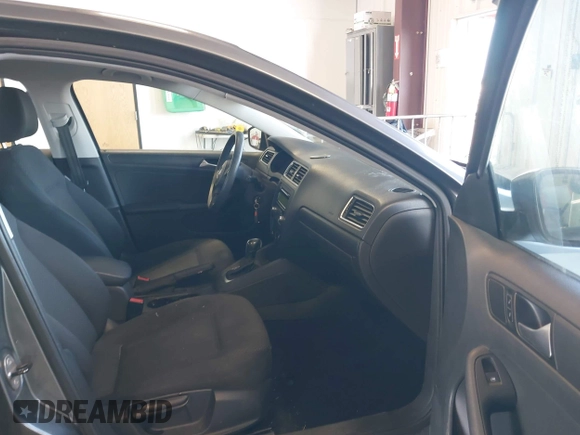 2014 Volkswagen Jetta Sedan S with VIN 3VW2K7AJ5EM410491, listed as a IAAI auction lot 42083614 with 65,960 mi miles. Bid and sale history available at carsss.com. Image 5.