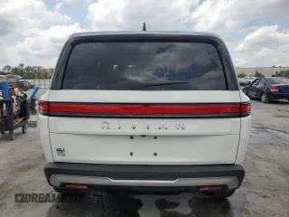 2025 Rivian R1S Adventure z VIN 7PDSGBBA5SN067374, wystawiony jako Copart lot #55279895 z przebiegiem 1 120 mil mil oraz Szkoda całkowita • Salvage title. Historia ofert i sprzedaży dostępna na DreamBid. Obrazek 6.