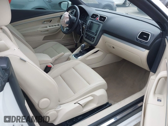 2012 Volkswagen Eos Komfort with VIN WVWBW7AH6CV004193, listed as a IAAI auction lot 42194925 with 71,401 mi miles and . Bid and sale history available at DreamBid. Image 5.