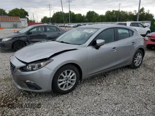 2014 Mazda 3 i Grand Touring z VIN JM1BM1M76E1115083, wystawiony jako Copart lot #58535965 z przebiegiem 68 618 mil mil oraz Szkoda całkowita • Salvage title. Historia ofert i sprzedaży dostępna na DreamBid. Obrazek 1.