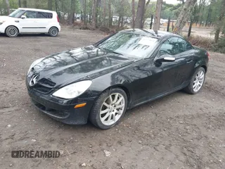 2007 Mercedes-Benz SLK 350 with VIN WDBWK56FX7F148904, listed as a IAAI auction lot 41975034 with 93,793 mi miles and . Bid and sale history available at DreamBid. Image 2.