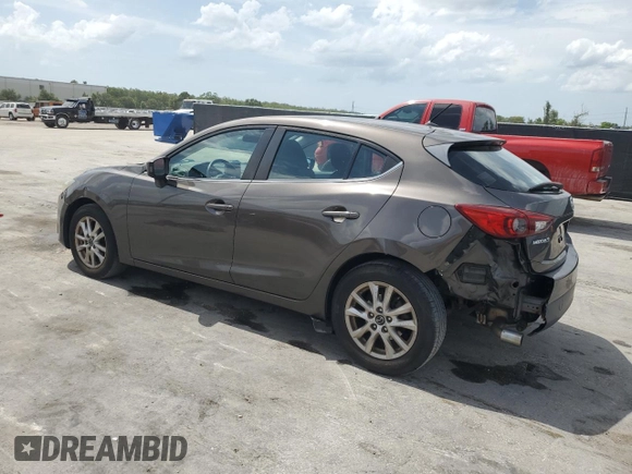 2014 Mazda 3 i Touring with VIN JM1BM1L71E1181056, listed as a Copart auction lot 59767705 with 129,447 mi miles and Salvage title. Bid and sale history available at DreamBid. Image 2.