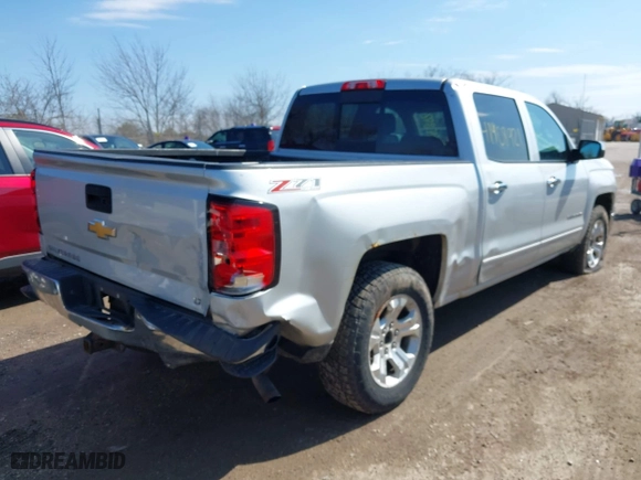 2015 Chevrolet Silverado 1500 LT with VIN 3GCUKREC0FG316716, listed as a IAAI auction lot 41908921 with 242,093 mi miles. Bid and sale history available at carsss.com. Image 6.