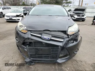 2013 Ford Focus Titanium with VIN 1FADP3J20DL276364, listed as a Copart auction lot 49815675 with 138,344 mi miles and Salvage Title. Bid and sale history available at carsss.com. Image 5.