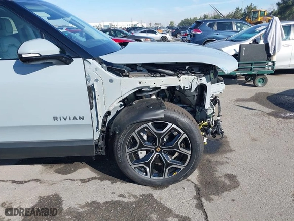 2025 Rivian R1S Adventure with VIN 7PDSGBBA9SN046978, listed as a IAAI auction lot 41467922 with 2,957 mi miles. Bid and sale history available at carsss.com. Image 21.