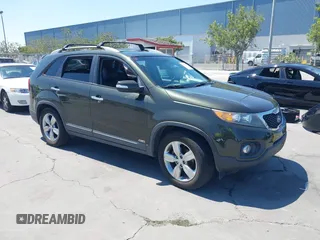 2012 Kia Sorento EX with VIN 5XYKUDA28CG252906, listed as a IAAI auction lot 42745975 with 214,016 mi miles and . Bid and sale history available at DreamBid. Image 1.