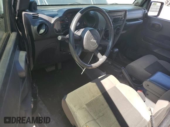 2008 Jeep Wrangler X z VIN 1J4FA24178L619687, wystawiony jako Copart lot #62535985 z przebiegiem 137 710 mil mil oraz Szkoda całkowita • Salvage title. Historia ofert i sprzedaży dostępna na DreamBid. Obrazek 8.