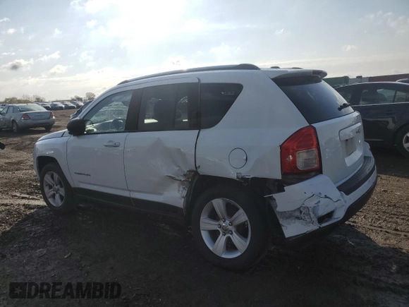 2011 Jeep Compass Latitude with VIN 1J4NT1FA2BD230700, listed as a Copart auction lot 77046644 with 93,502 mi miles and Salvage Title. Bid and sale history available at carsss.com. Image 2.