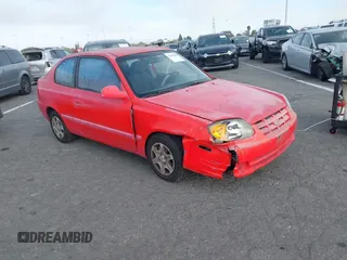 2003 Hyundai Accent GL with VIN KMHCG35C23U238969, listed as a IAAI auction lot 41462884 with 156,682 mi miles. Bid and sale history available at carsss.com. Image 1.