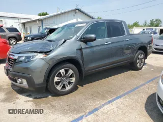2017 Honda Ridgeline RTL-E with VIN 5FPYK3F74HB039715, listed as a Copart auction lot 60271415 with 56,892 mi miles and Salvage title. Bid and sale history available at DreamBid. Image 1.