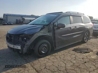2018 Honda Odyssey Touring z VIN 5FNRL6H83JB009998, wystawiony jako Copart lot #60616695 z przebiegiem 101 880 mil mil oraz Szkoda całkowita • Salvage title. Historia ofert i sprzedaży dostępna na DreamBid. Obrazek 1.
