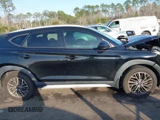 2019 Hyundai Tucson Sport z VIN KM8J33AL9KU878474, wystawiony jako IAAI lot #41568959 z przebiegiem 97 412 mil mil oraz . Historia ofert i sprzedaży dostępna na DreamBid. Obrazek 13.
