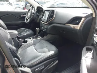 2016 Jeep Cherokee Limited with VIN 1C4PJLDS8GW233799, listed as a IAAI auction lot 41734376 with 114,187 mi miles. Bid and sale history available at carsss.com. Image 5.