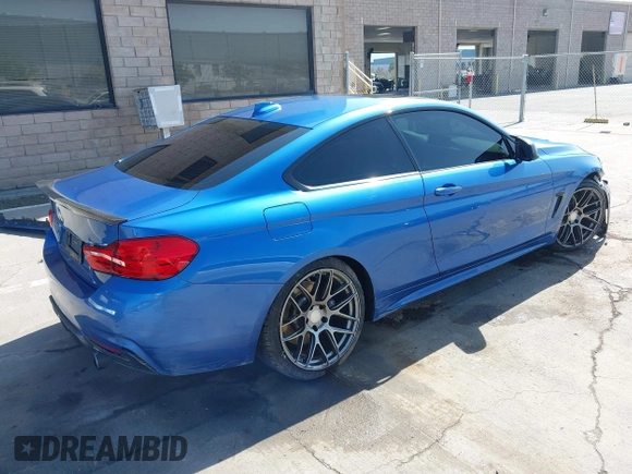 2015 BMW 4 Series 435i with VIN WBA3R1C50FF774588, listed as a IAAI auction lot 42001394 with 96,400 mi miles and . Bid and sale history available at carsss.com. Image 4.