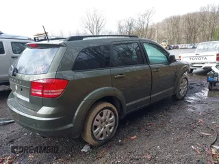 2018 Dodge Journey SE with VIN 3C4PDCABXJT496661, listed as a IAAI auction lot 41908124 with 82,257 mi miles. Bid and sale history available at carsss.com. Image 4.