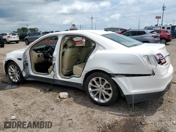 2015 Ford Taurus Limited with VIN 1FAHP2F82FG148180, listed as a Copart auction lot 62354685 with 107,998 mi miles and Salvage title. Bid and sale history available at DreamBid. Image 2.