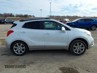 2016 Buick Encore Premium with VIN KL4CJDSB3GB607132, listed as a IAAI auction lot 41526249 with 50,617 mi miles and . Bid and sale history available at carsss.com. Image 13.