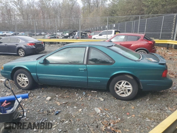1997 Ford Thunderbird LX with VIN 1FALP6245VH171563, listed as a Copart auction lot 81970734 with 67,304 mi miles and Clean Title. Bid and sale history available at DreamBid. Image 2.