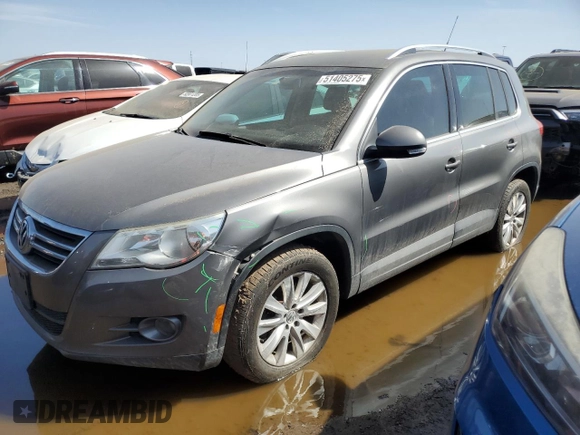 2010 Volkswagen Tiguan S with VIN WVGAV7AX4AW504264, listed as a Copart auction lot 51405275 with 113,432 mi miles and Salvage title. Bid and sale history available at DreamBid. Image 1.