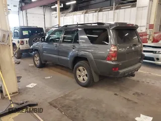 2005 Toyota 4Runner SR5 with VIN JTEBT14R158023791, listed as a IAAI auction lot 42011427 with 142,289 mi miles and . Bid and sale history available at DreamBid. Image 3.