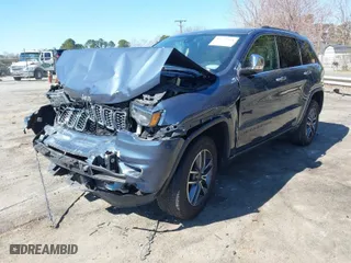 2019 Jeep Grand Cherokee Limited X with VIN 1C4RJFBG4KC812565, listed as a IAAI auction lot 41779418 with 100,296 mi miles. Bid and sale history available at carsss.com. Image 2.
