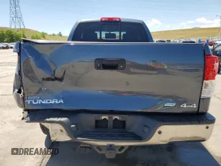 2010 Toyota Tundra with VIN 5TFUW5F14AX148898, listed as a Copart auction lot 63316765 with 79,983 mi miles and Salvage title. Bid and sale history available at DreamBid. Image 6.