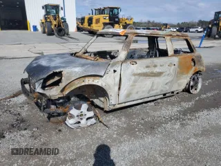 2010 MINI Hardtop z VIN WMWMF3C59ATZ26662, wystawiony jako Copart lot #48895325 z przebiegiem Nie podano mil oraz Szkody całkowita. Historia ofert i sprzedaży dostępna na DreamBid. Obrazek 1.