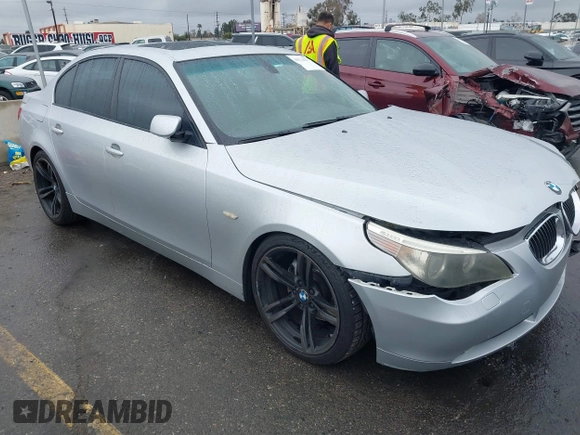 2007 BMW 5 Series 530i with VIN WBANE73507CM46579, listed as a IAAI auction lot 41511577 with 168,904 mi miles. Bid and sale history available at carsss.com. Image 1.