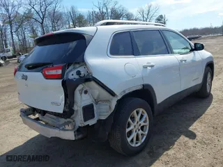 2015 Jeep Cherokee Latitude with VIN 1C4PJMCS1FW795579, listed as a IAAI auction lot 41661163 with 108,246 mi miles. Bid and sale history available at carsss.com. Image 4.