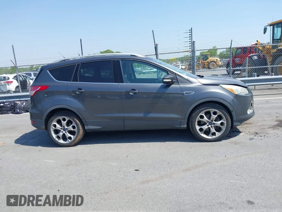 2015 Ford Escape Titanium with VIN 1FMCU0J94FUB24350, listed as a IAAI auction lot 42065641 with 168,215 mi miles. Bid and sale history available at carsss.com. Image 13.