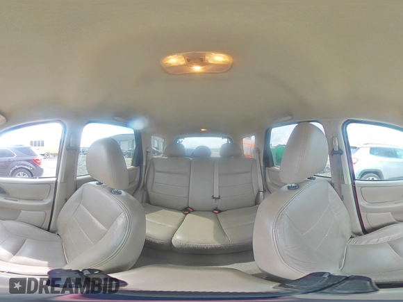 2005 Ford Escape Limited with VIN 1FMYU04165KA33277, listed as a Copart auction lot 54407625 with 217,317 mi miles and Salvage title. Bid and sale history available at DreamBid. Image 14.
